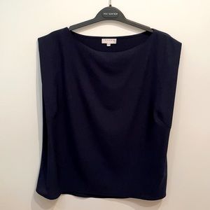 Freda’s navy sleeveless boat neck blouse
